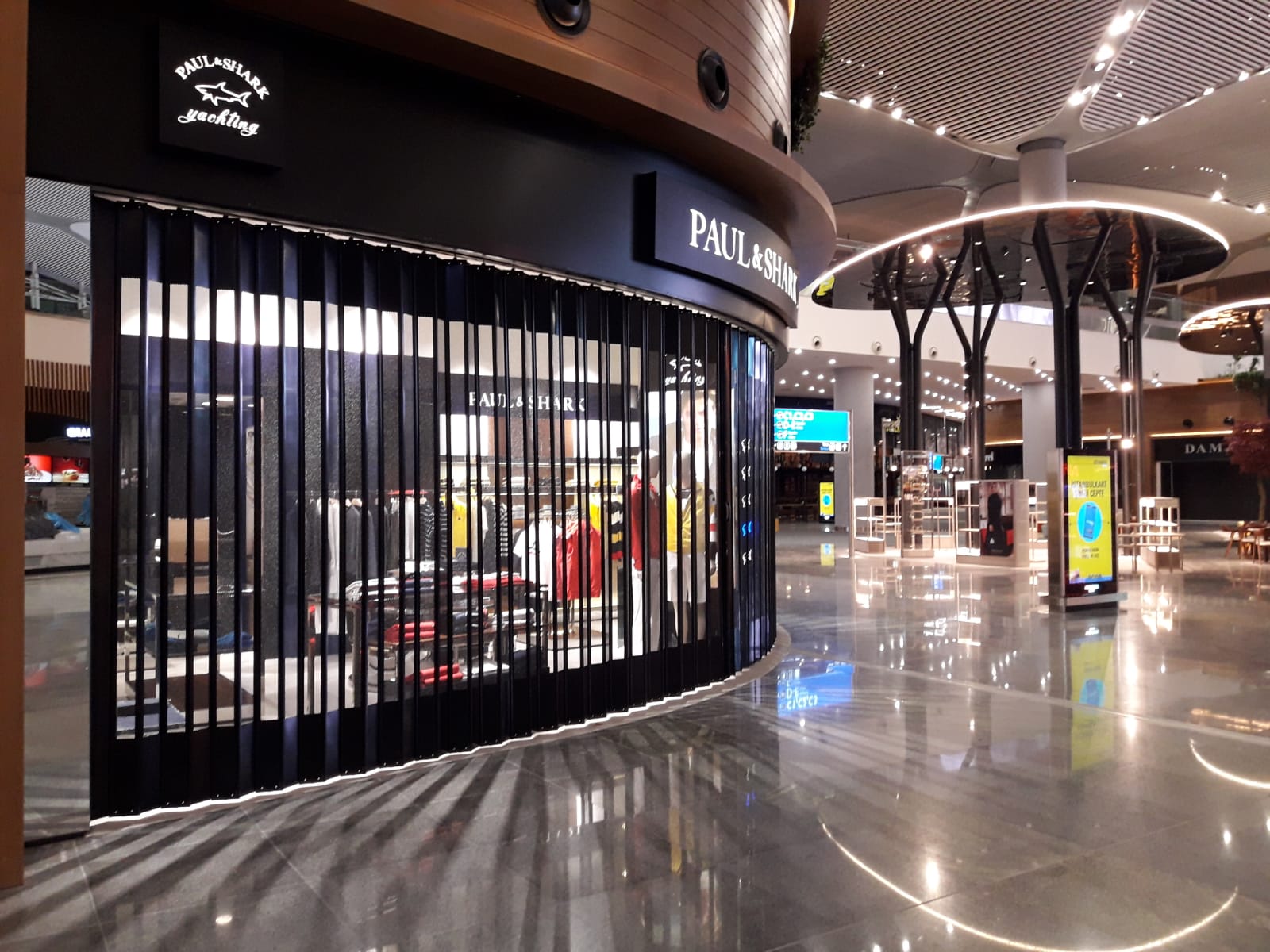 PAUL SHARK 3. AIRPORT DUTY FREE AREA – SLIDING FOLDING SHUTTER SYSTEM